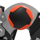 Детайл на механизъм с черно и оранжево топче, част от инструмент, предназначен за прецизно използване.